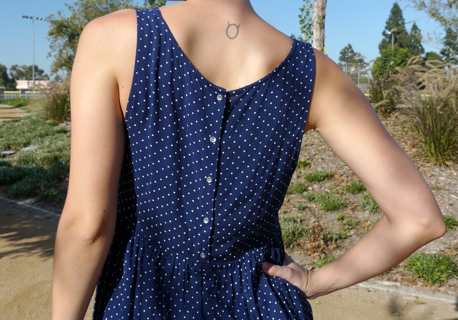 Thrift-style-polka-dot-dress-button-back-detail-taurus-tattoo